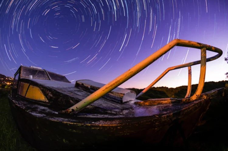 Stacking it, framing the southern axis over North Piha's only shipwreck