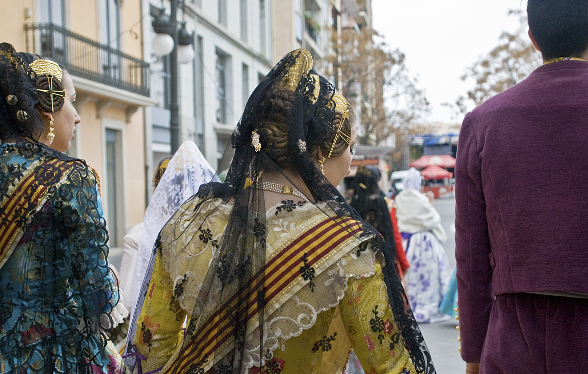 Every neighborhood in Valencia has its own falla and its own falleras and falleros. These people basically make up each neighborhood's committee that is responsible for raising money for, and developing the neighborhood's falla. Their dresses are intricate, handmade works of art, and their hair is always styled in an elaborate set of braids and combs, that has been the tradition as long as the Las Fallas festival has existed.