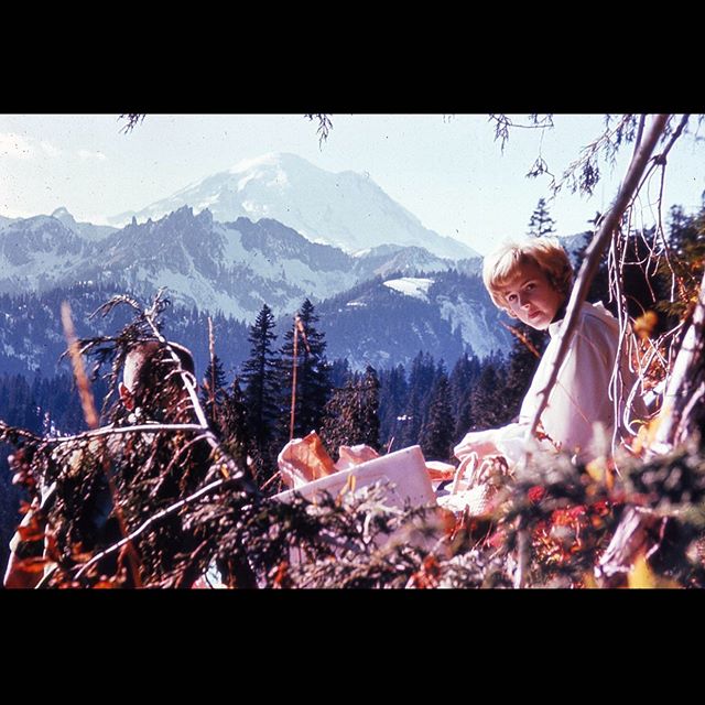 My parents at Mt. Rainier in &lsquo;67. My dad must have set up the shot before he got back in position behind the branch. He took a lot of photos in his 45 years, but his one has to be one of the best. Just discovered by @deckled in a box of old sli