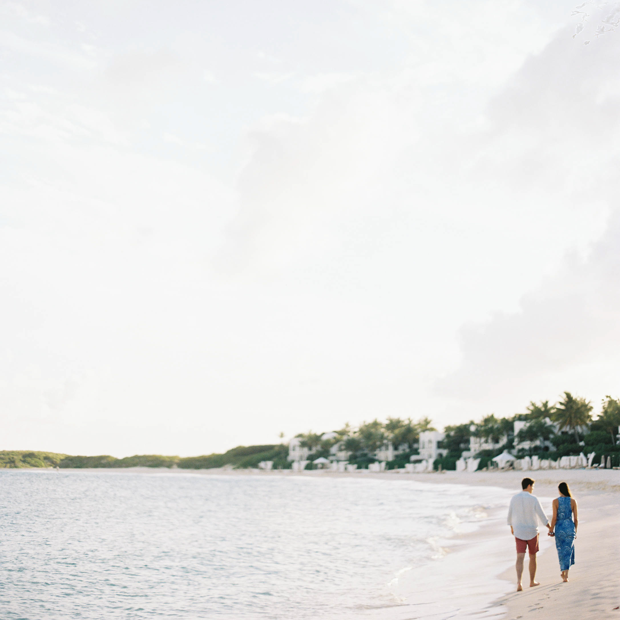 Walking with your toes in the sand at Cap Juluca Resort's Maundays Bay is a must for all visitors to Anguilla. Photo by Jen Huang Photography. 