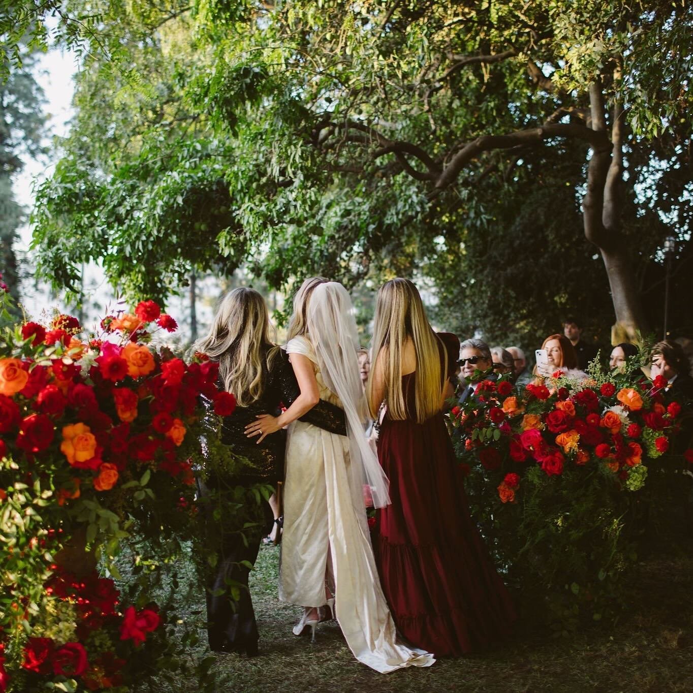 A special moment as the bride is accompanied down the aisle by her mother and sister.

Photo @theshalomimaginative 
Florals @hiddengardenflowers 
Catering @spottedhencatering 
Music @dartcollective 
Rentals @premiere_rents
