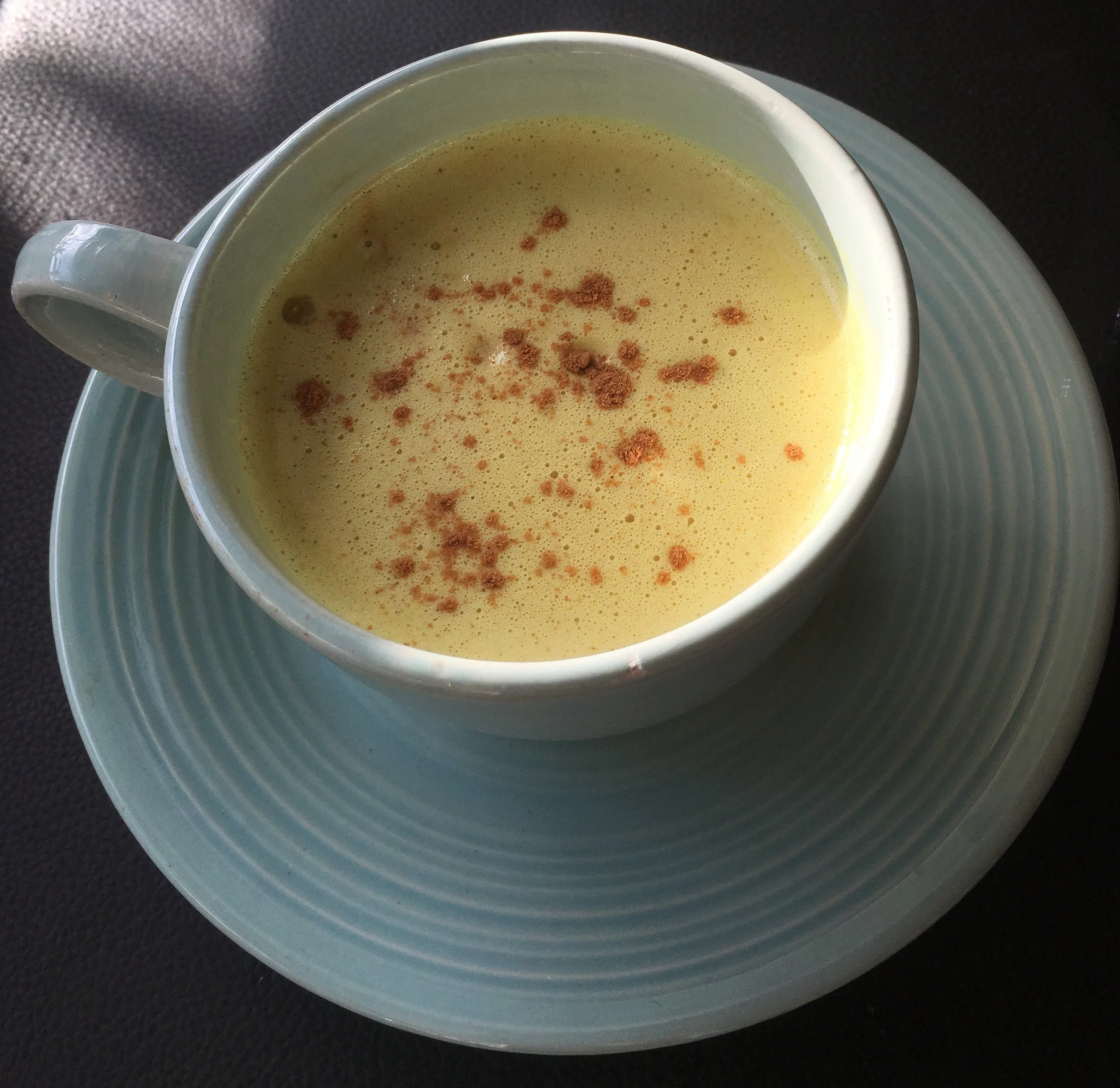 Tumeric, Ginger, Cinnamon, Agave with a shot of Nespresso
