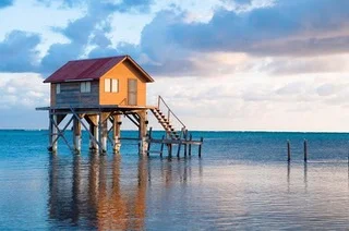 AMBERGRIS CAYE WATER AND HOUSE.jpeg