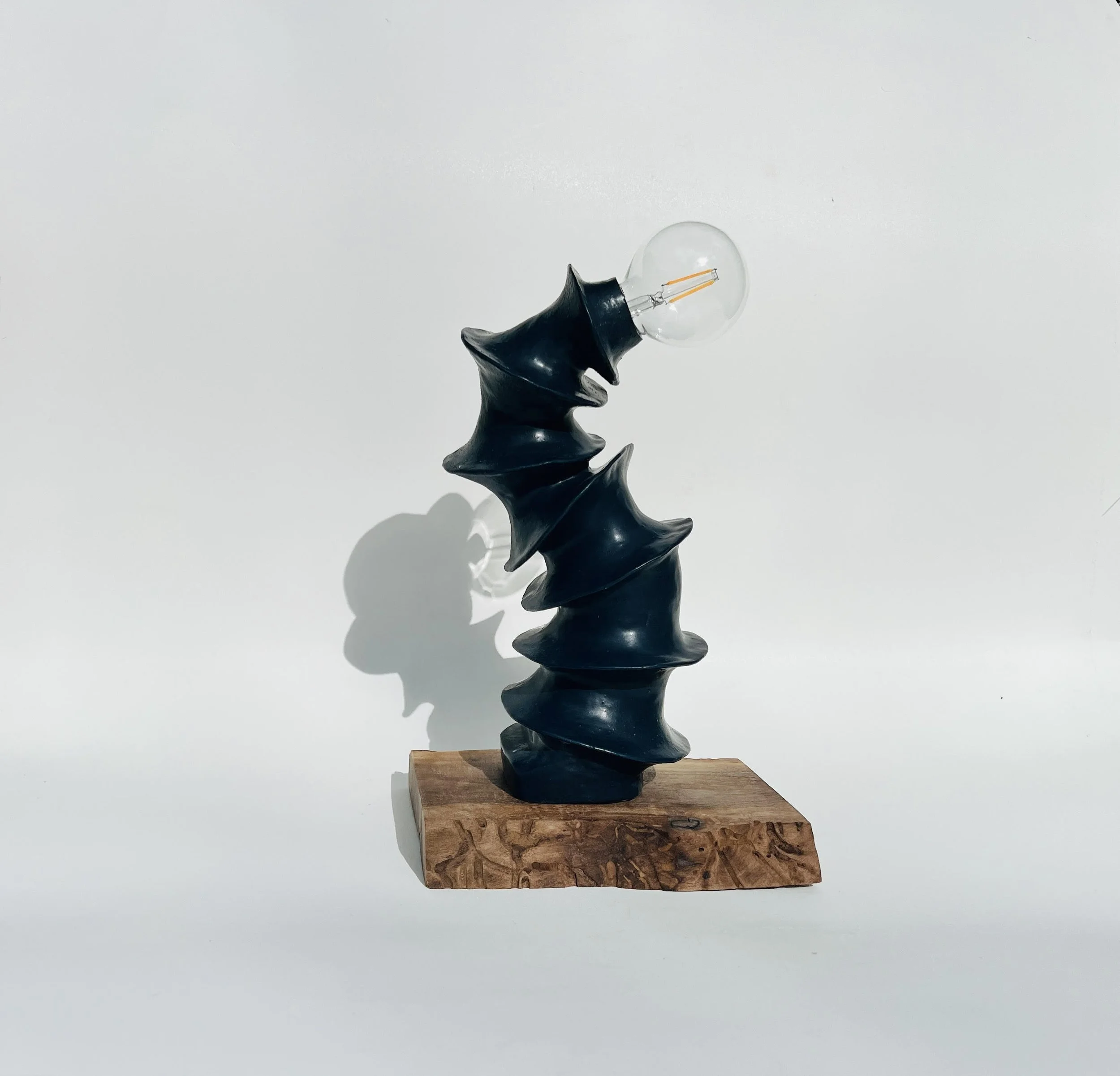 SPINES black lamp | Stoneware on Carved Walnut Stand | 18 x 10 x 8 inches | $1100
