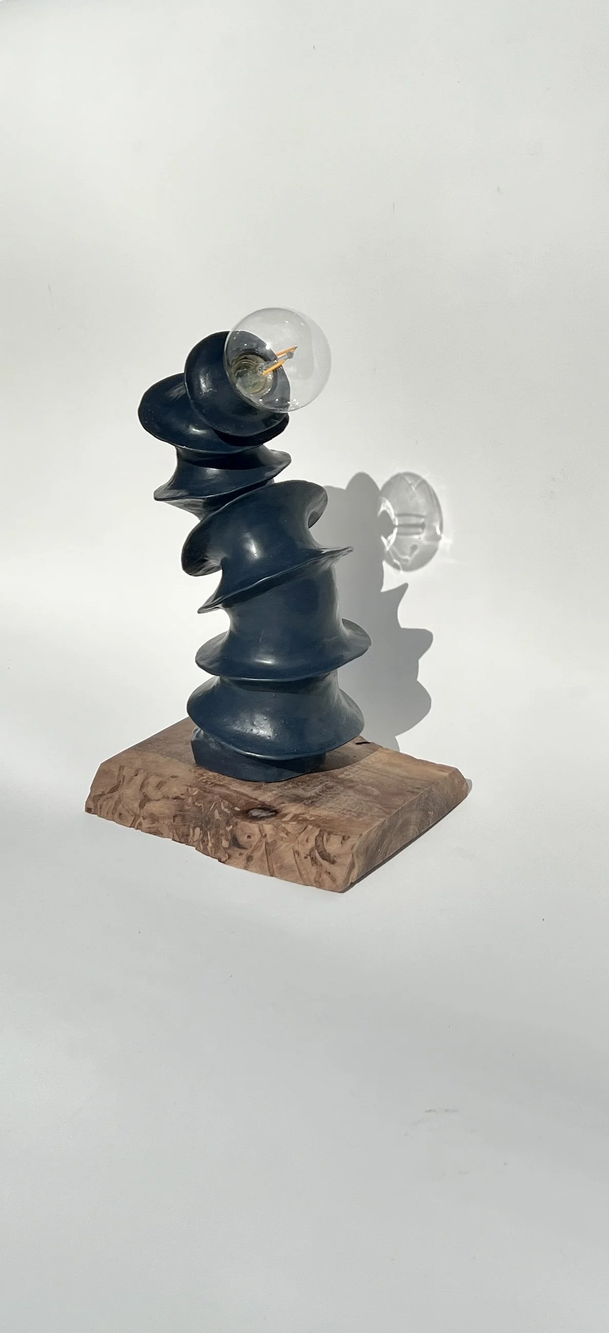 SPINES black lamp | Stoneware on Carved Walnut Stand | 18 x 10 x 8 inches | $1100