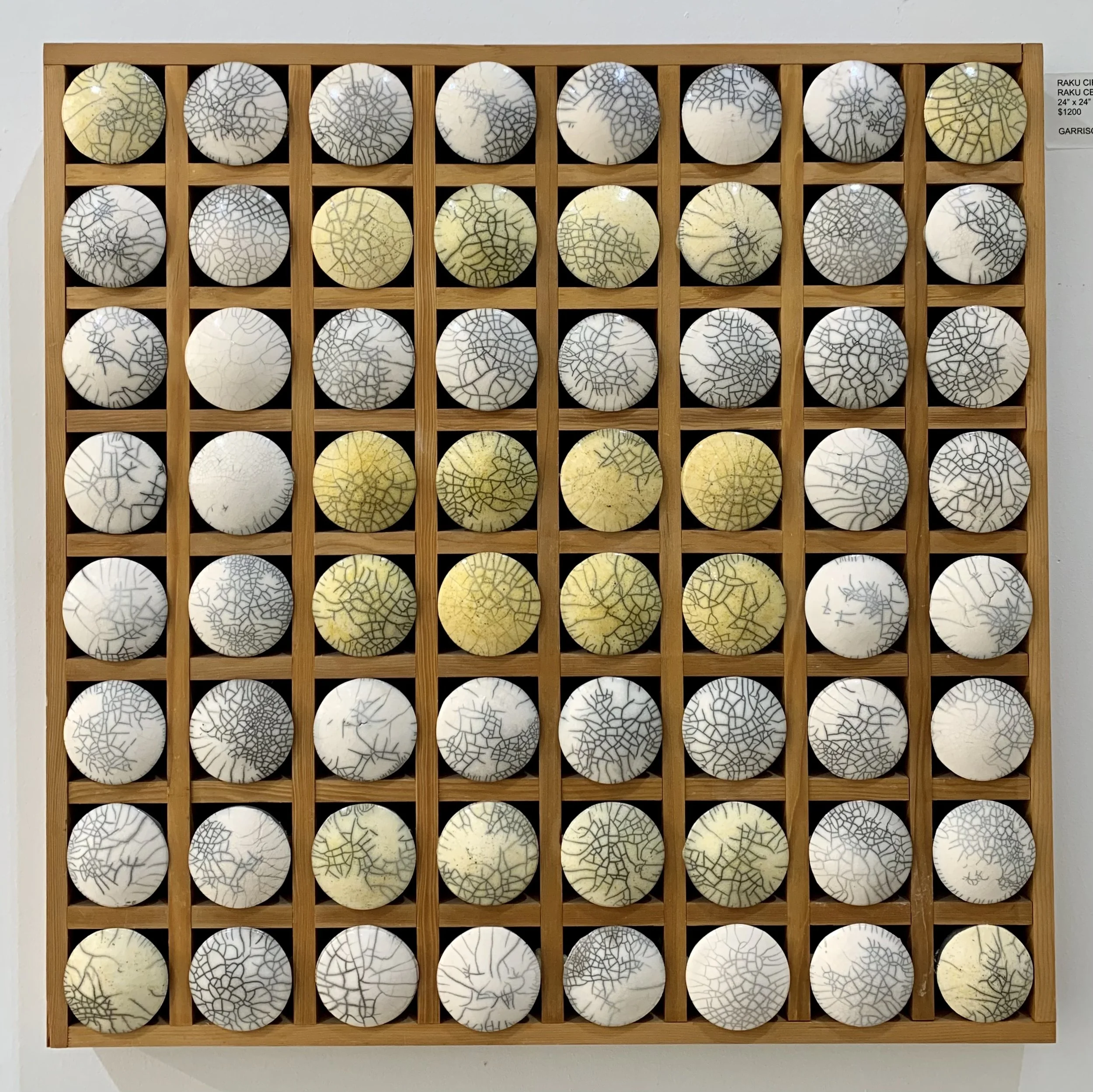 Raku Circles I  |  Ceramics, Raku Glaze and Wood | 24" x 24" | $1200