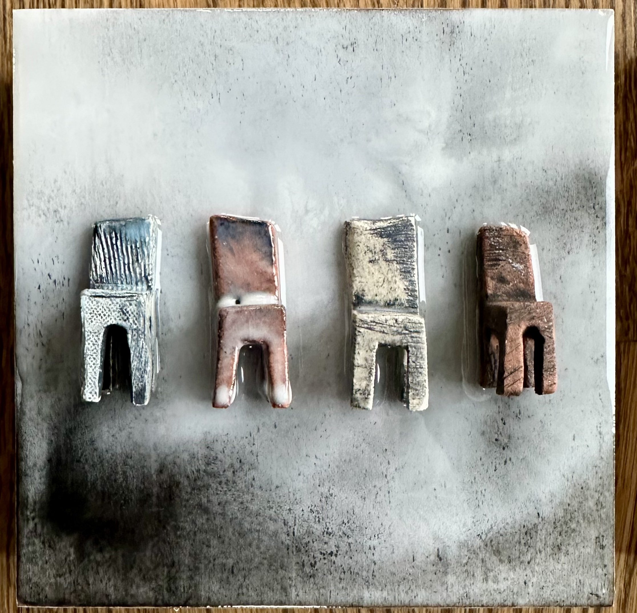 Community 2 Ceramic, Stain, Glaze, Acrylic Paint and Epoxy Resin on