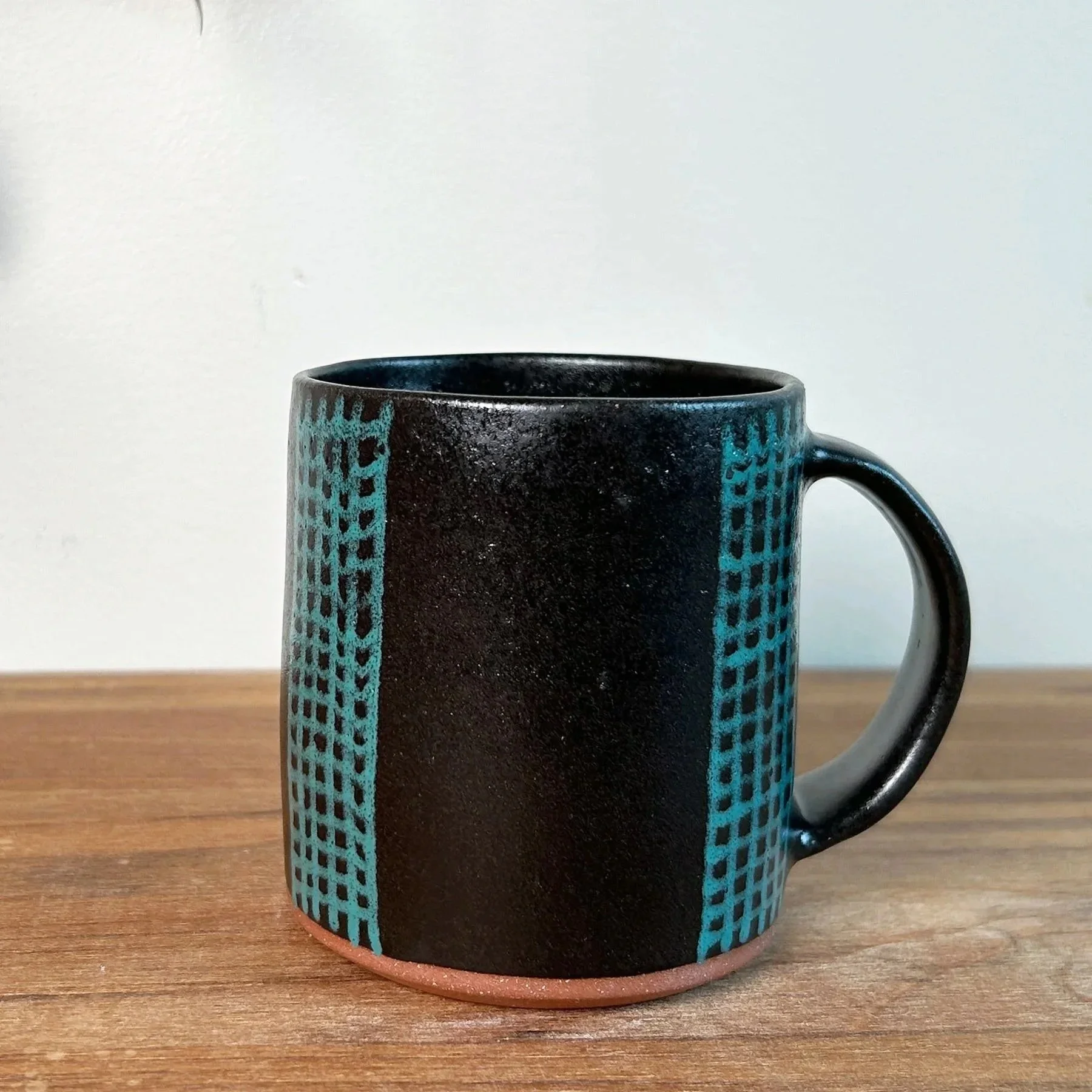 blkmugtuqcrosshatch.jpg