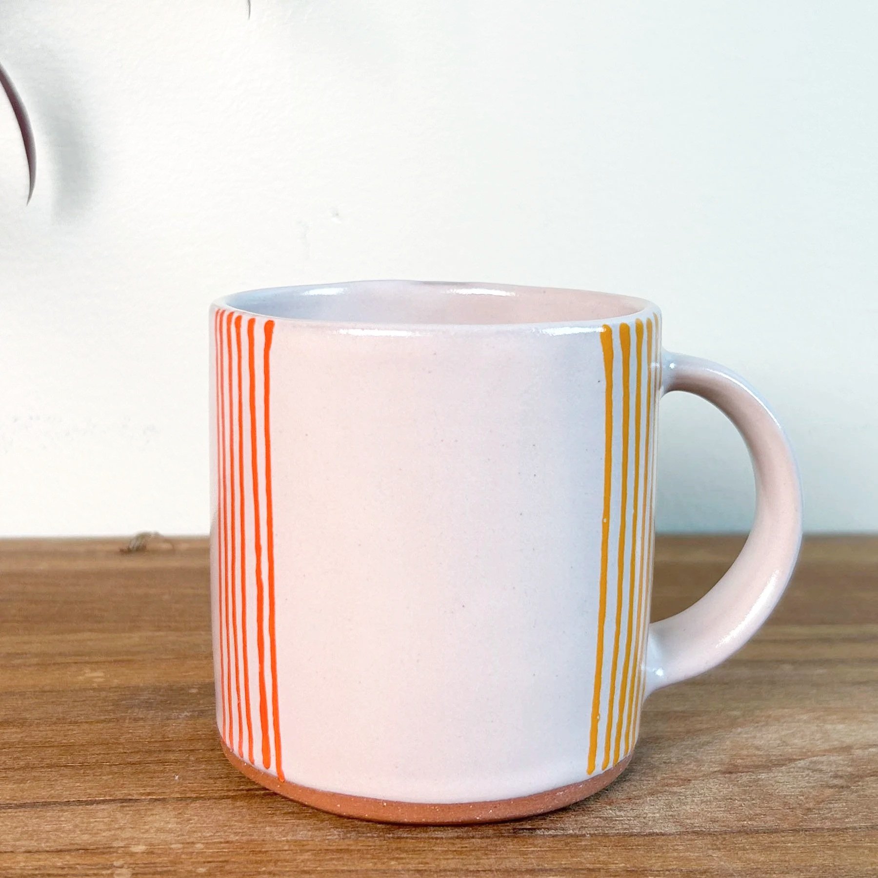 whitemugwithorangestripe.jpg