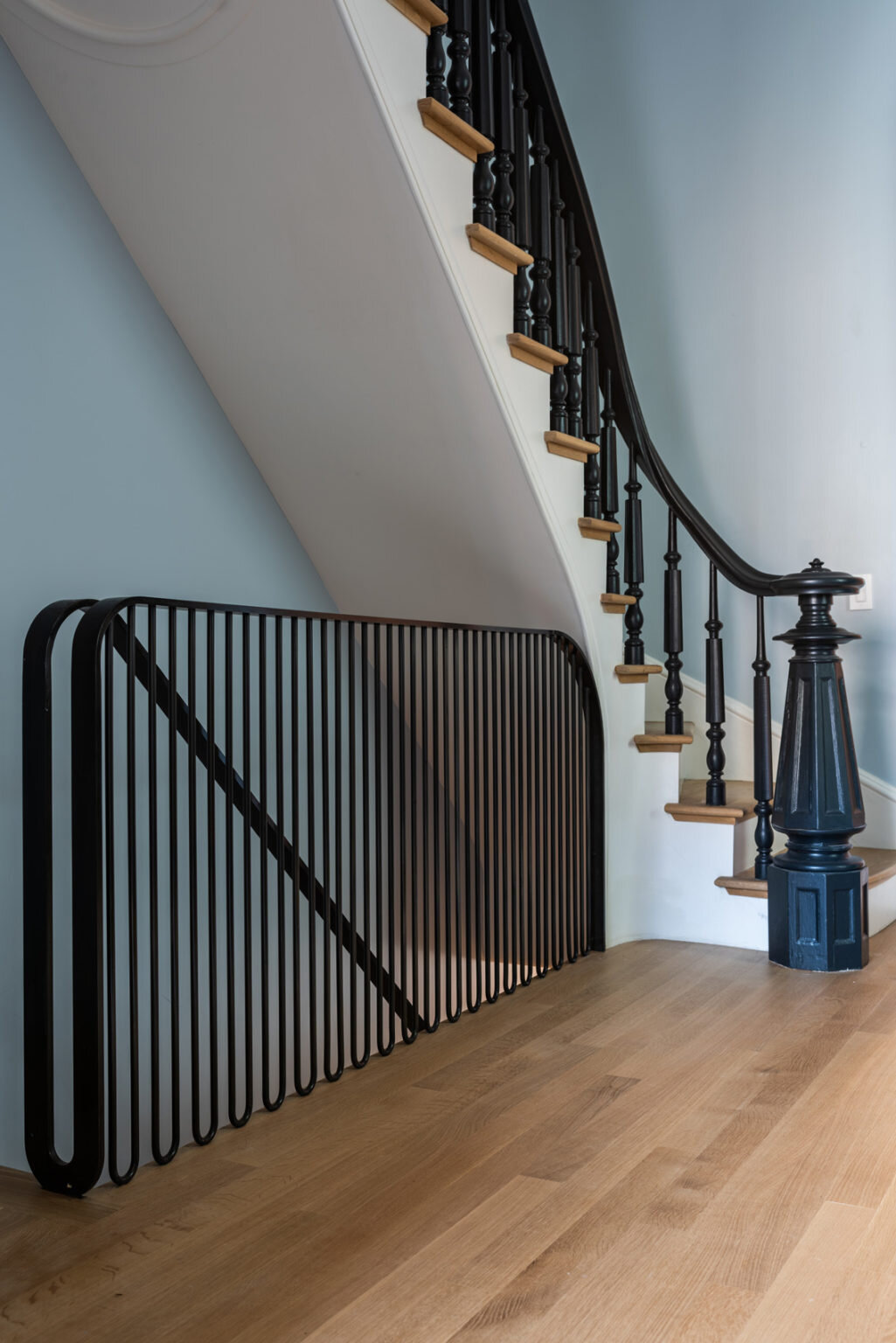  Blackened steel handrail fabricated with Kin and Company, designed by Michael Chen 