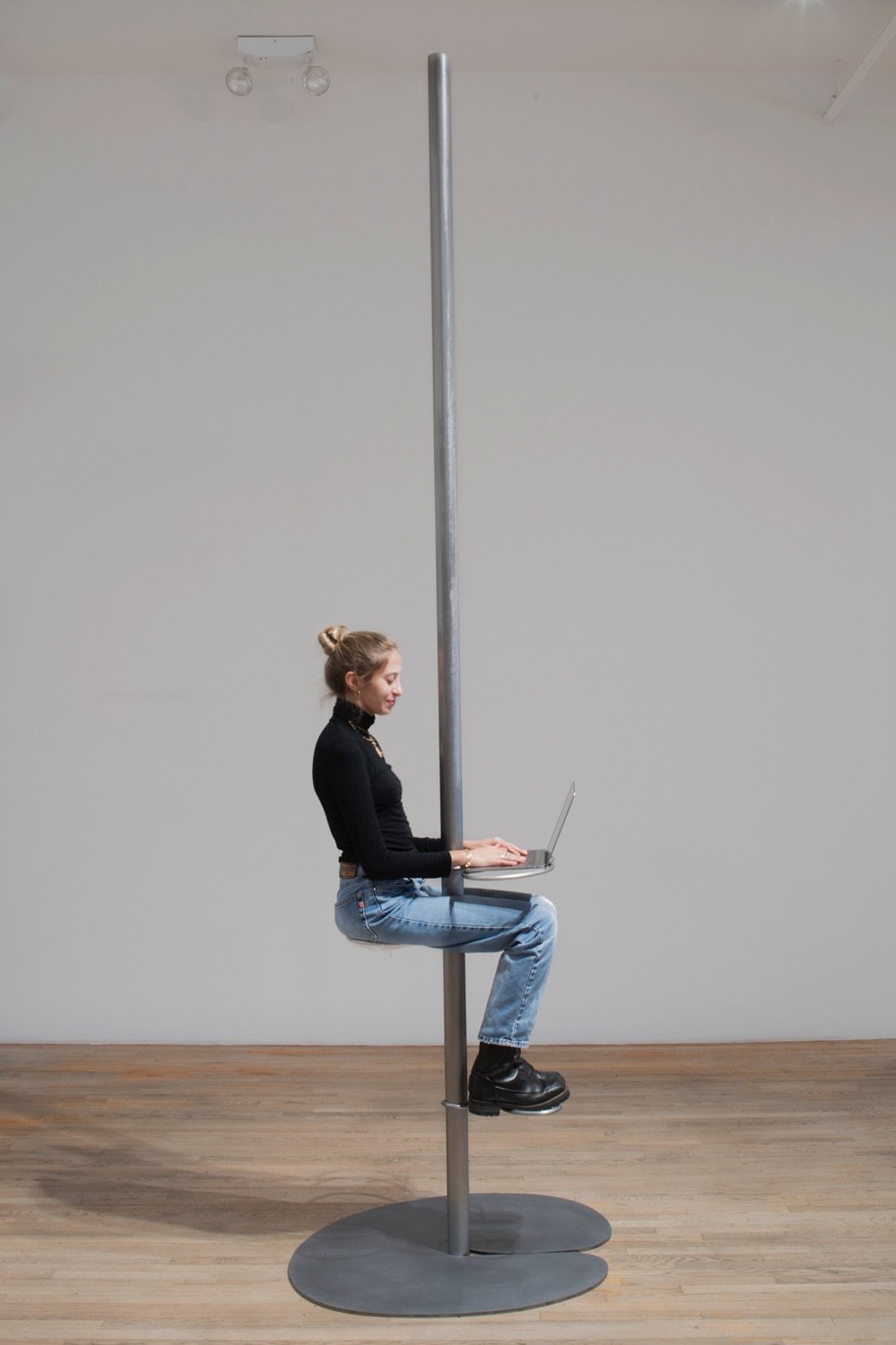  Stainless steel Pole Chair design by artist Chando Ao. 