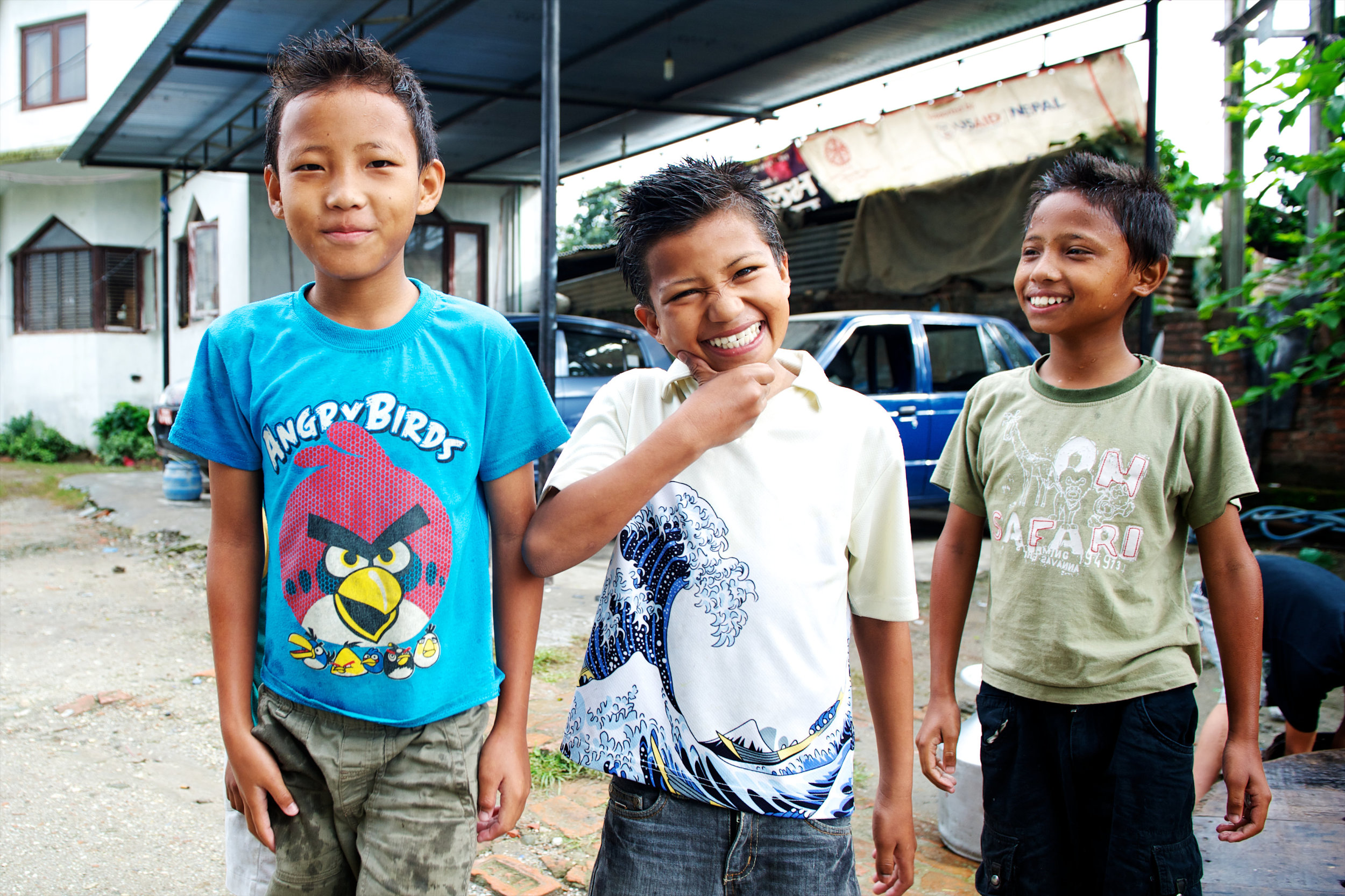 3 boys smiling.jpg