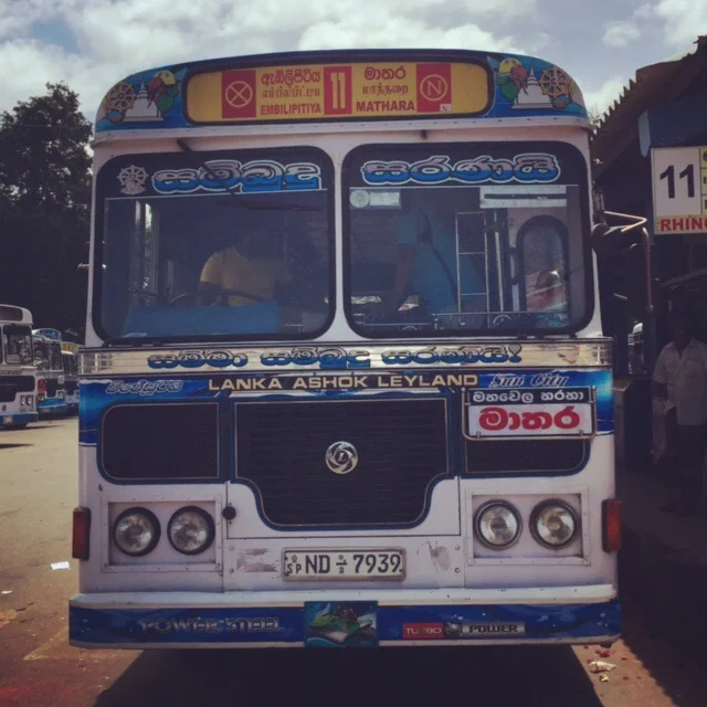 What a bus in Sri Lanka looks like. Not the bus to Sigiriya/Dambulla from Kandy but usually (but not always) has the start/end of the route on the top of the bus. Buses often make many local stops and blast Sri Lankan and Bollywood pop music the entire way.