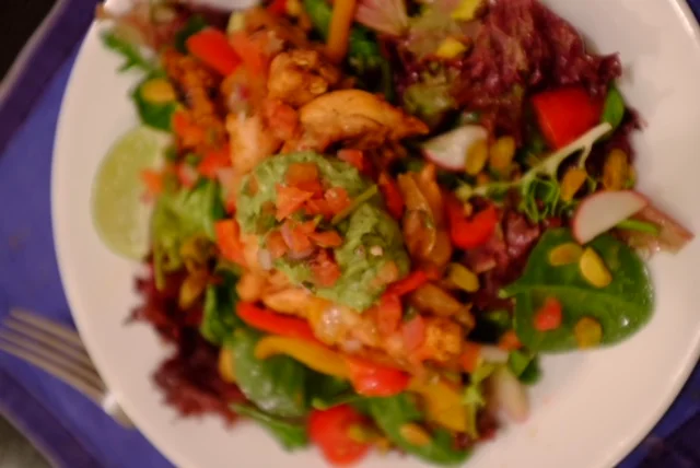 Salad with chicken fajitas on top. Somehow I managed to photograph this to look like a gauzy image from a silent movie.