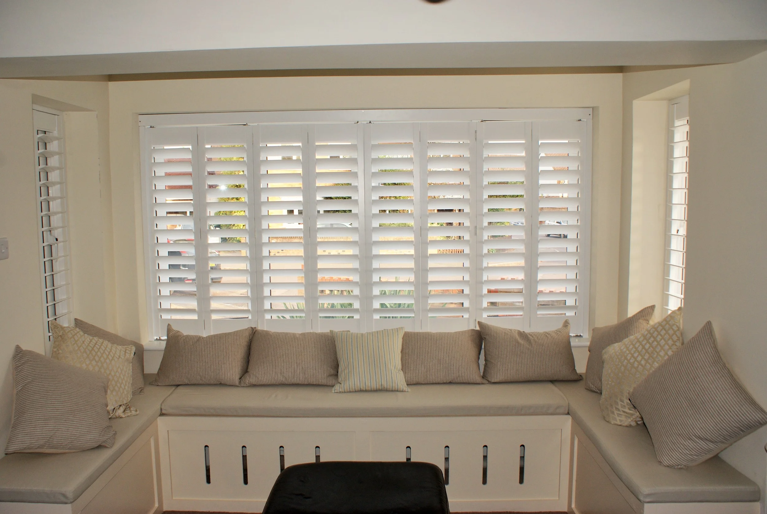 bay-window-with-seat-and-cushions-with-plantation-shutters-verwood-dorset-£1125.JPG
