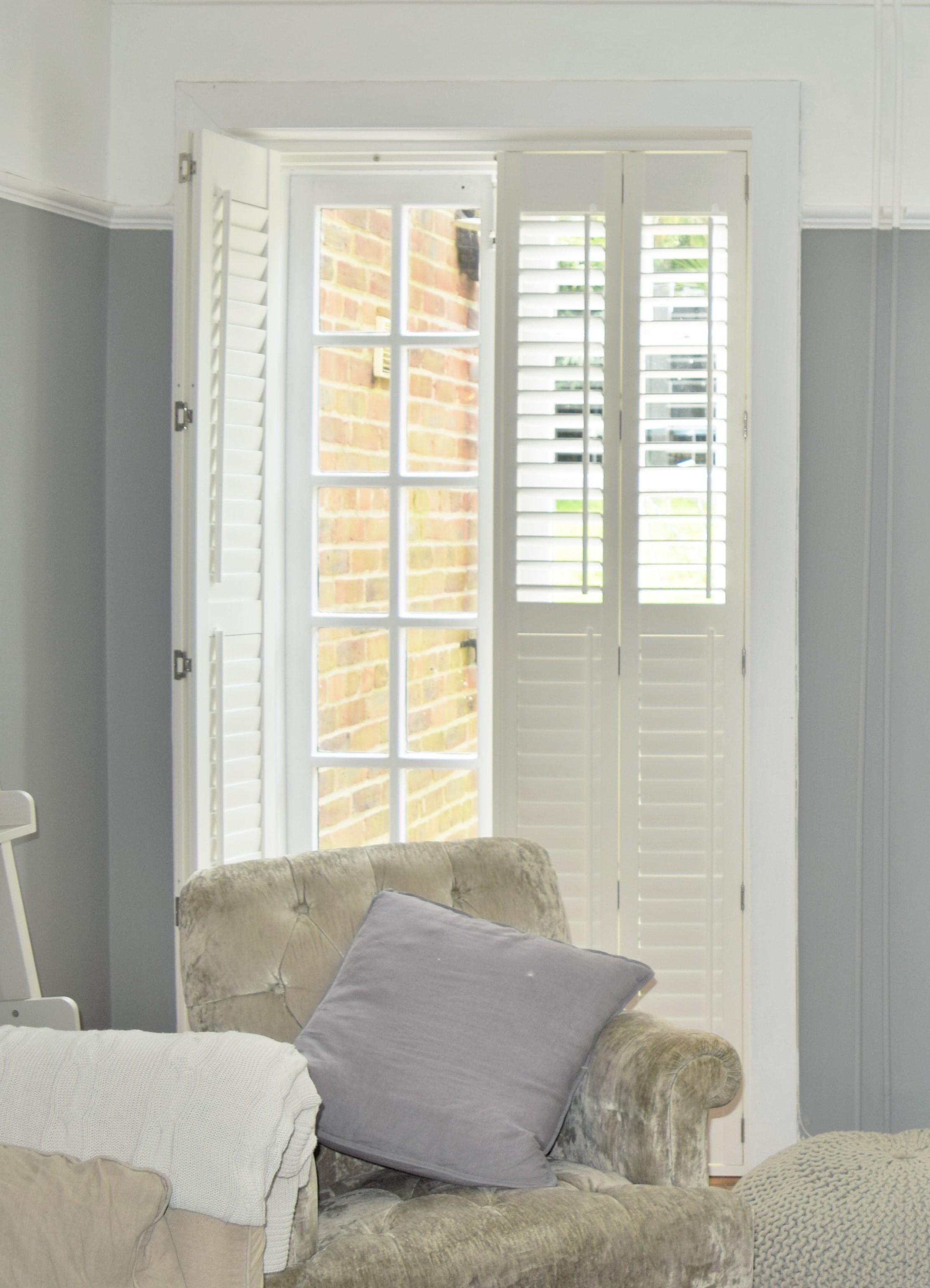 Plantation shutters on French georgian doors 