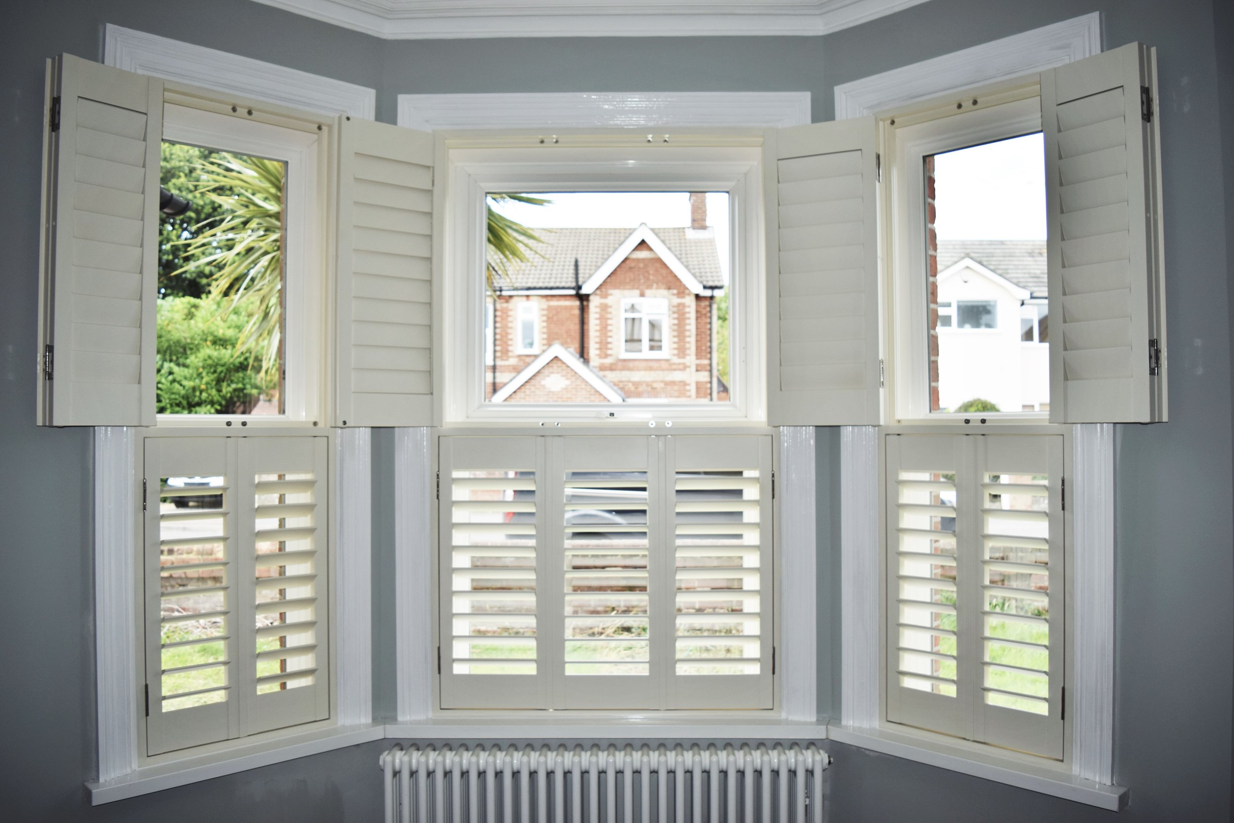 Tier on tier shutters with top tier open Bournemouth.JPG