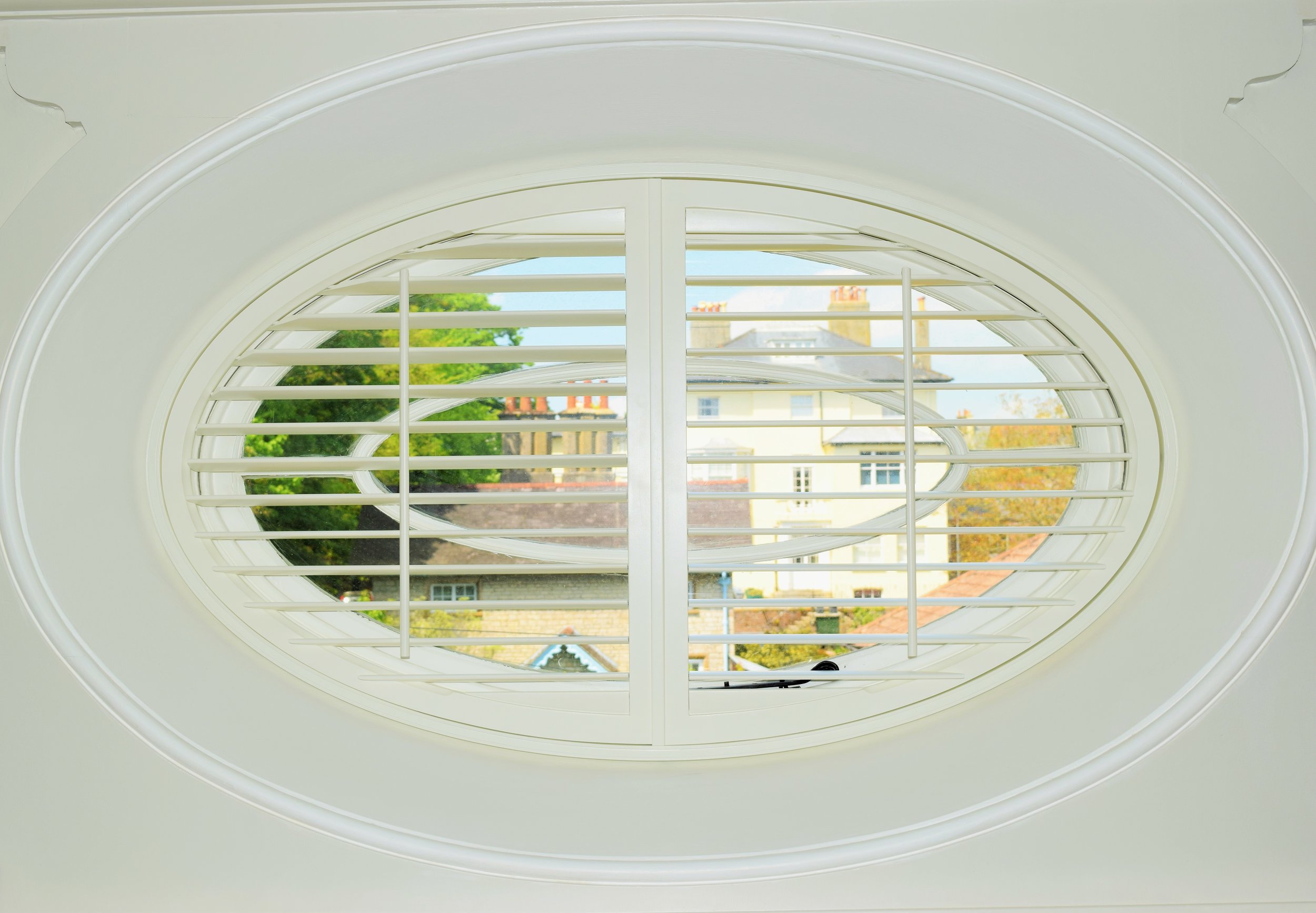 Special shapes plantation shutters oval Dorchester Dorset.JPG