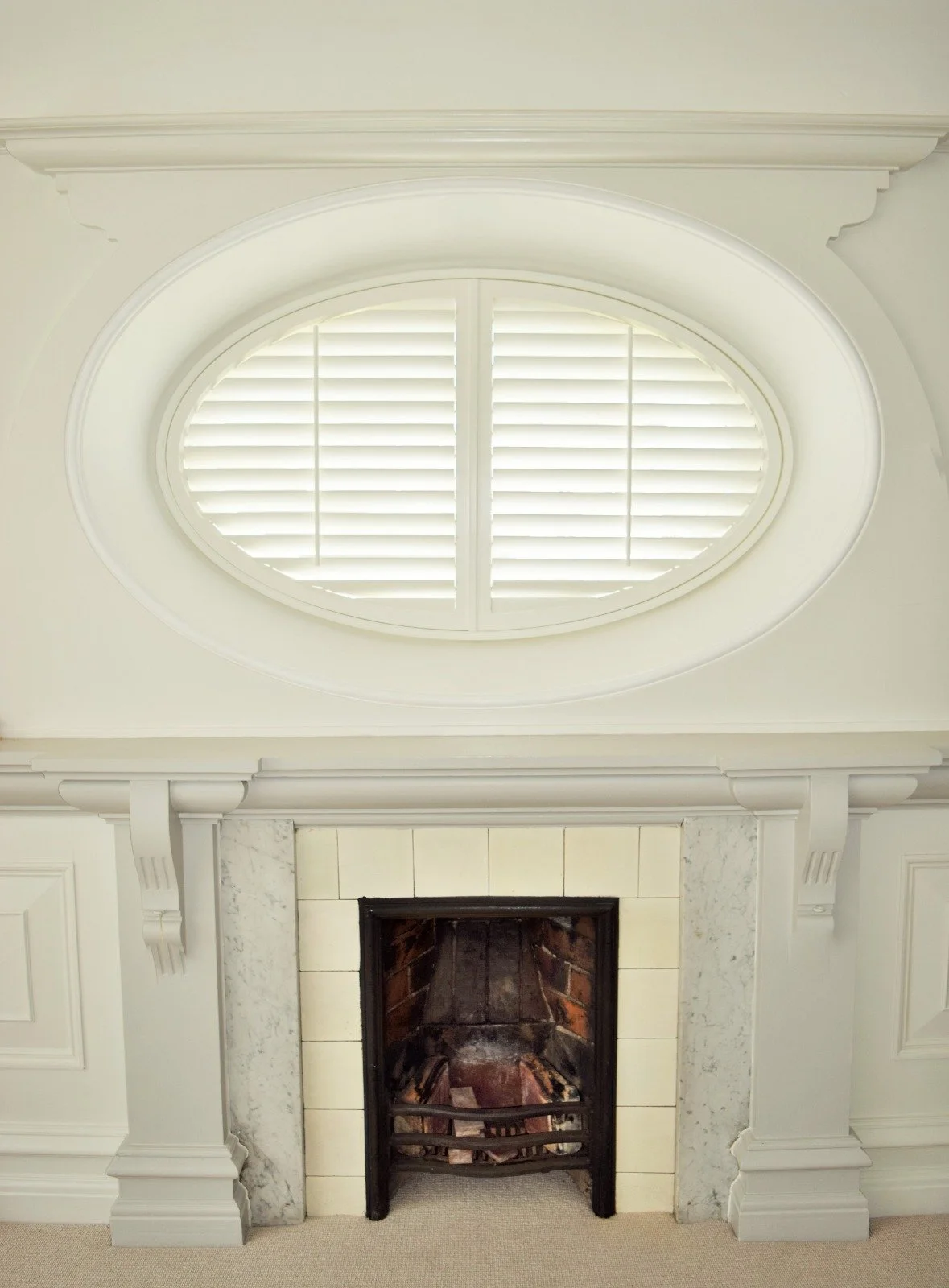 Oval Shutter Installation.jpeg