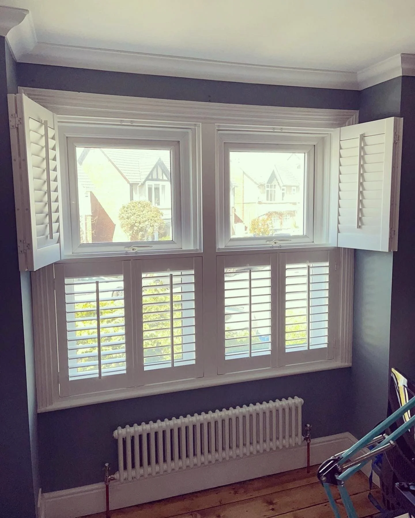 Tier on Tier Shutters with Tilt Rods Open.jpeg