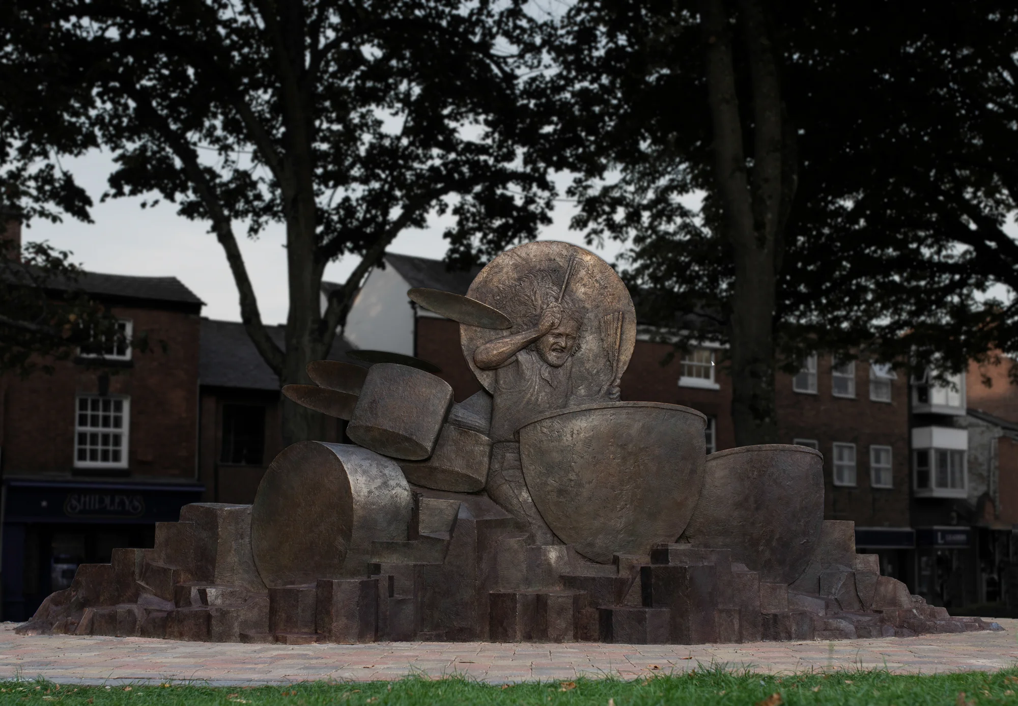 This photograph shows the portrait side of the free-standing double-sided relief sculpture, composed as an arc measuring 2 x 5 metres.