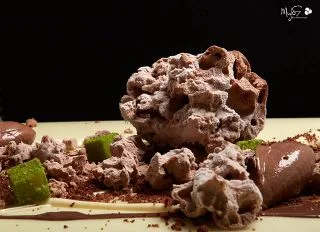Try the delicious “Chocolate Painting” dessert at Mylos. You can thank me later…