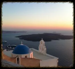 The famous blue dome church in Firostefani, Santorini