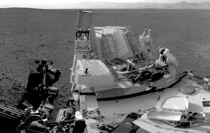 The Mars Science Laboratory rover, Curiosity, took this self portrait, which shows its Radioisotope Thermoelectric Generator (RTG) at center. Location: The Heights of Mount Sharp . Image Credit : NASA/JPL-Caltech. 