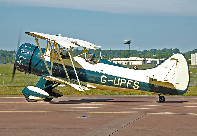 Waco Aircraft Company Waco UPF-7. Image source: Waco UPF-7 (G-UPFS) arrives RIAT Fairford 10thJuly2014 arp.jpg by Arpingstone is in the public domain .
