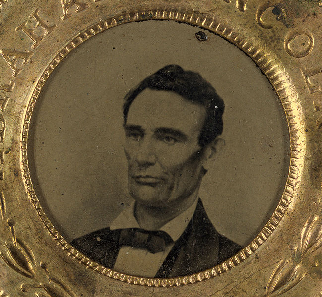 Campaign button for Abraham Lincoln, 1860. Portrait appears in tintype. Image source: Lincoln button 1860 small high contrast.jpg (originally derived from Library of Congress ) by Mathew Brady is licensed under Public Domain Mark 1.0