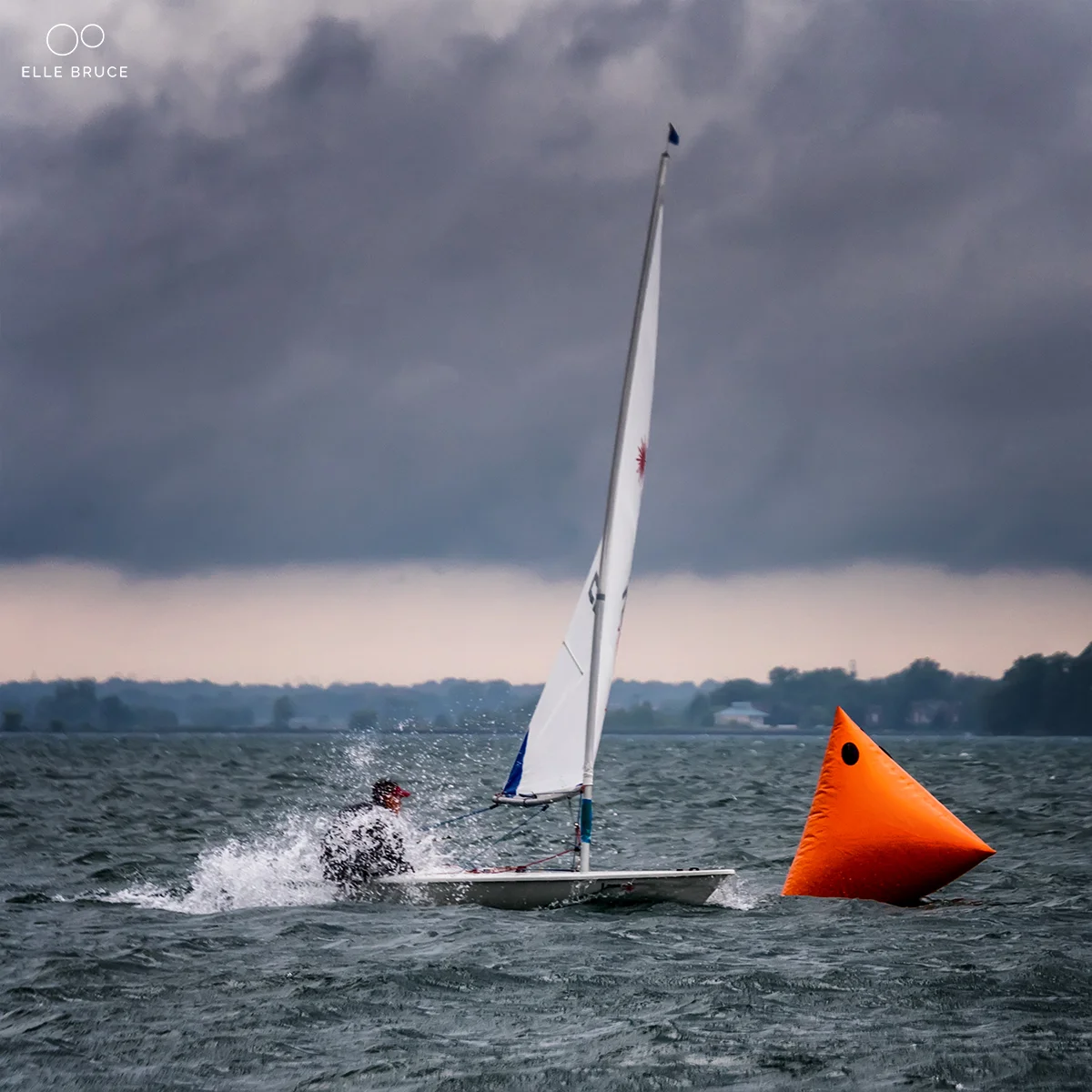 Race 6 - rounding the leeward mark just after the squall had passed.