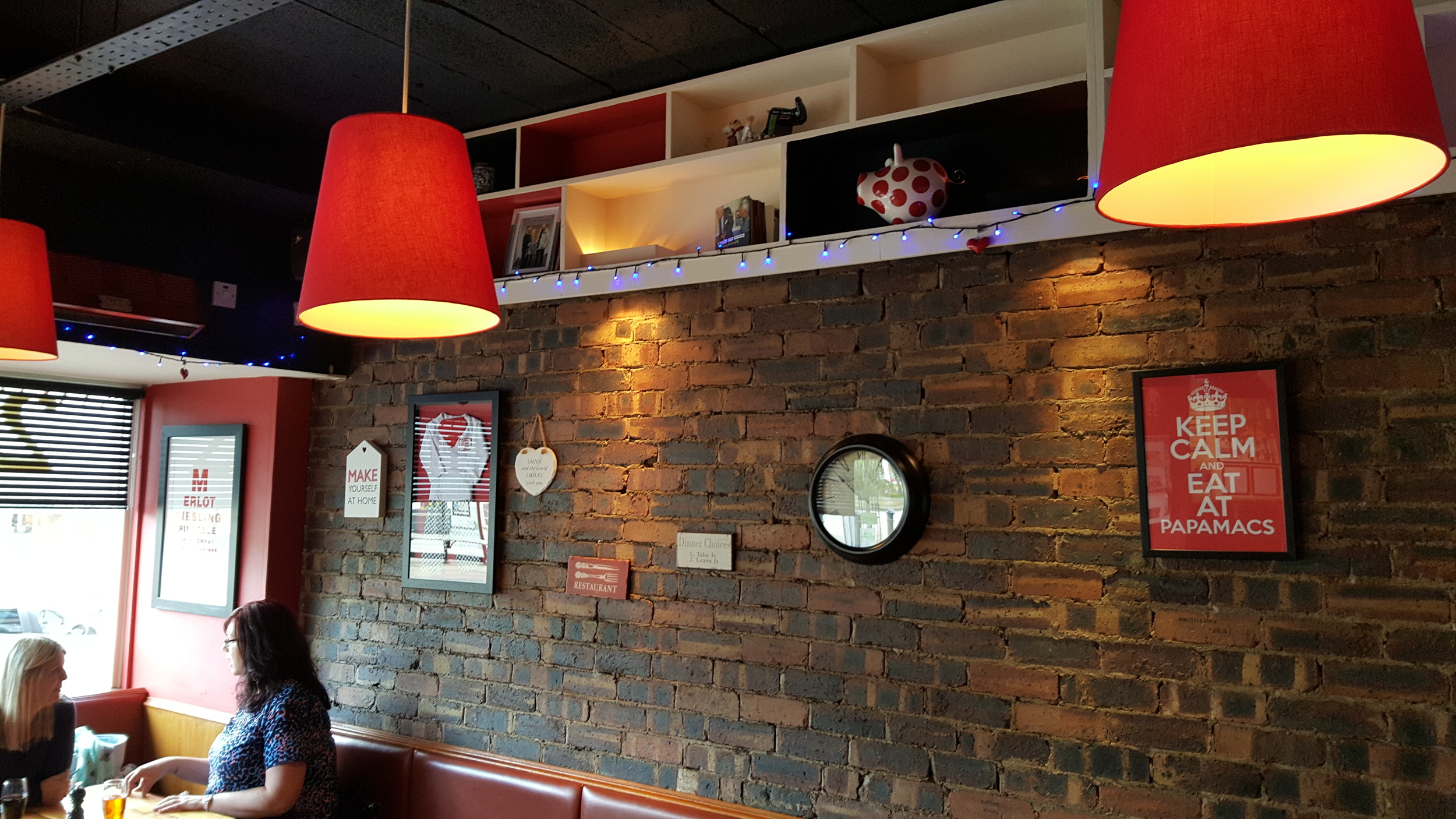 Old Papamacs decor - lots of nice nik naks and framed items, all in the signature deep red. In danger of feeling quite busy.