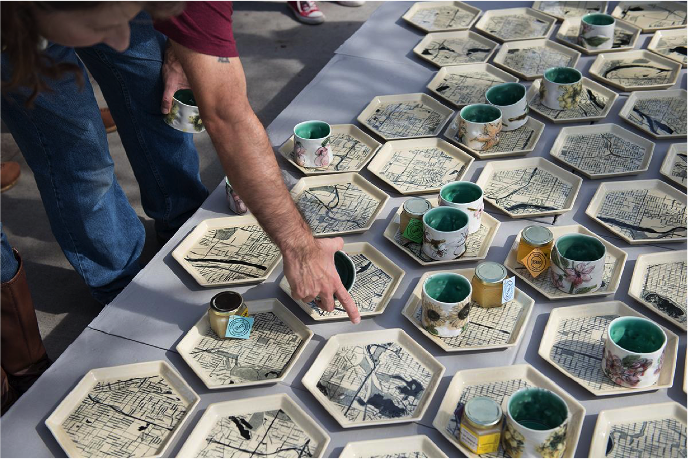Anna Metcalfe. Pop-up Pollinator Picnic, 2016 . Ceramic. 48 place settings per picnic. 1” x 6” x 7” (dimension for one plate). Photo courtesy of Anna Metcalfe.