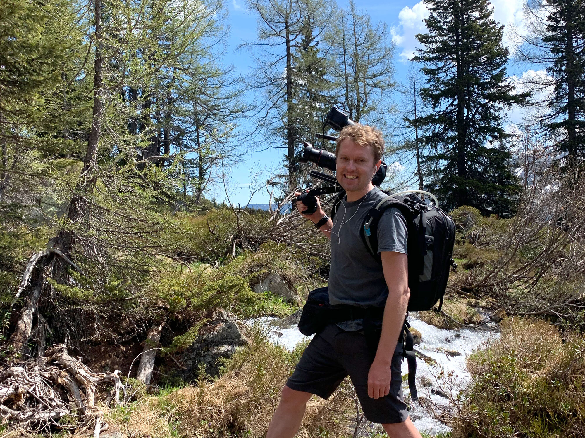 Happy to have a camera on his shoulder in the Alps!