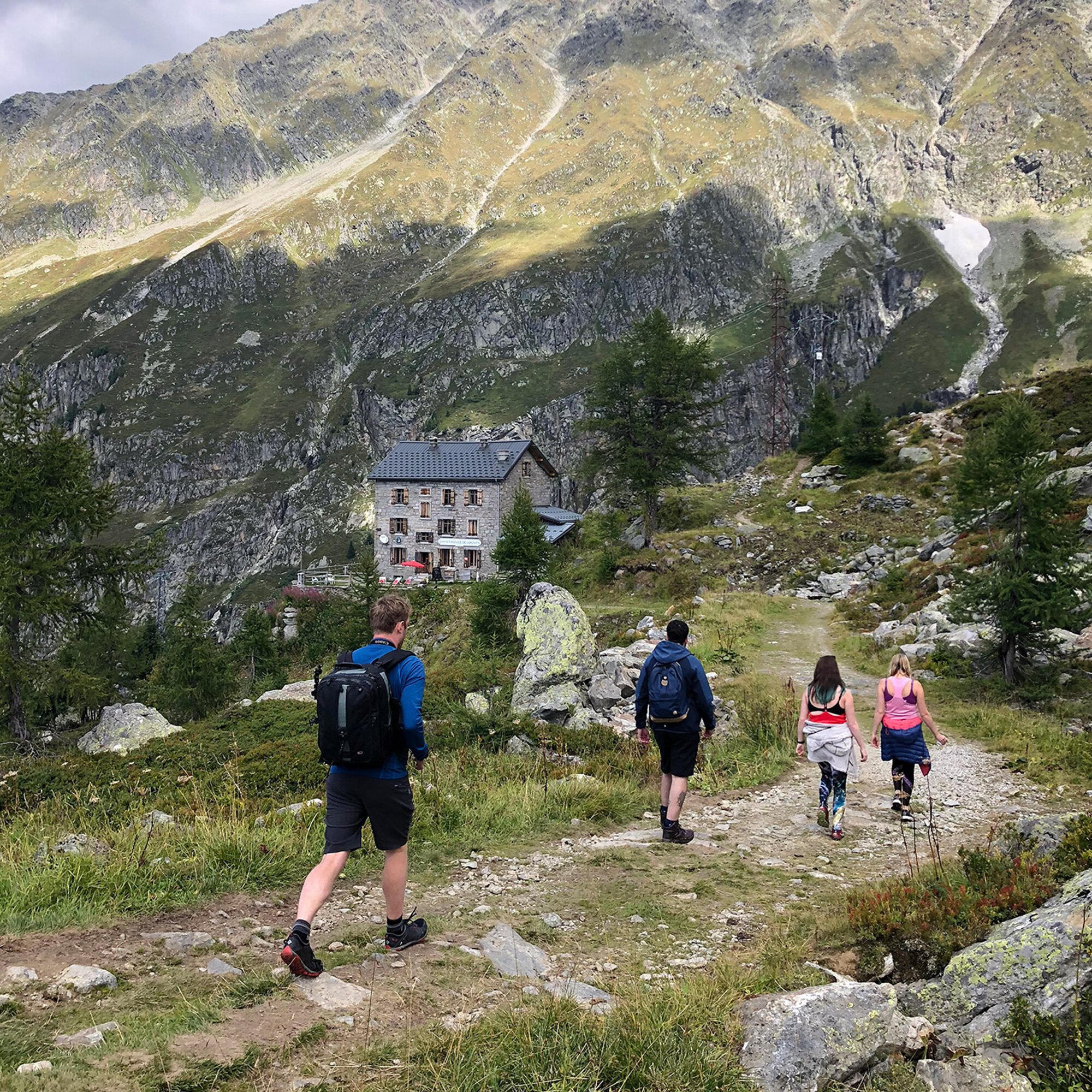 Hiking up to a mountain refuge for a team lunch