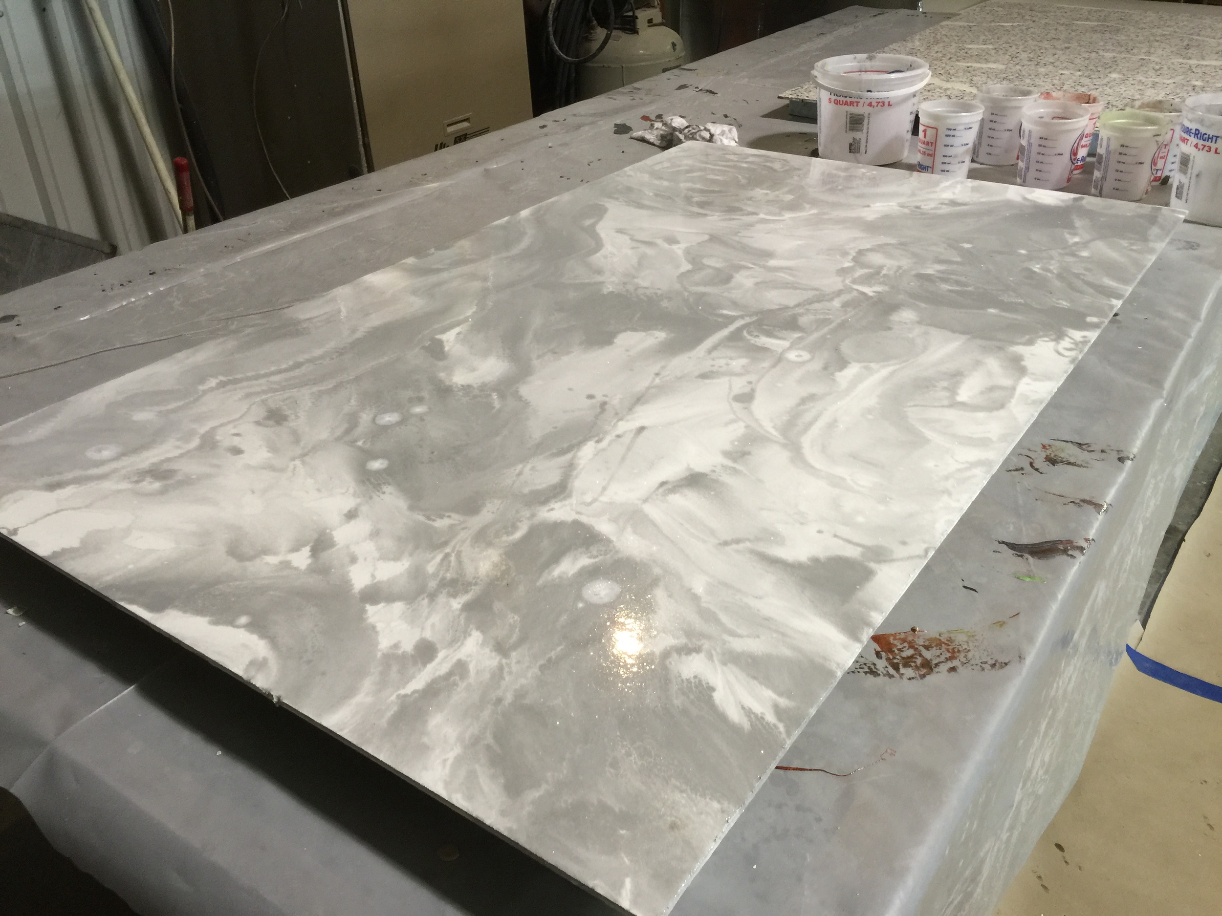 Epoxy overlays are made up of COMPONENTS that lock tightly onto the existing concrete or sub-floor. Epoxies are highly durable and popular in garage and warehouse applications although they are gaining APPRECIATION as a basement or main floor covering by contractors nationwide.