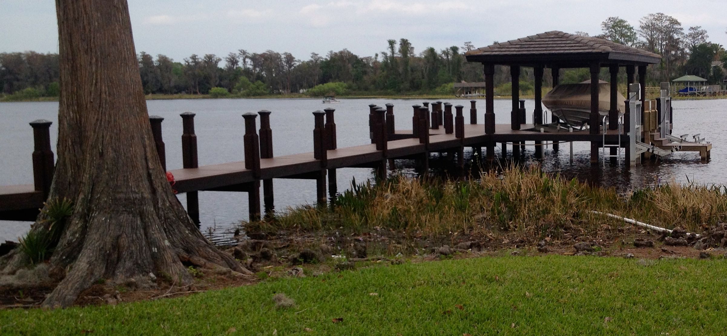 Dock with Boathouse and PWC Lifts