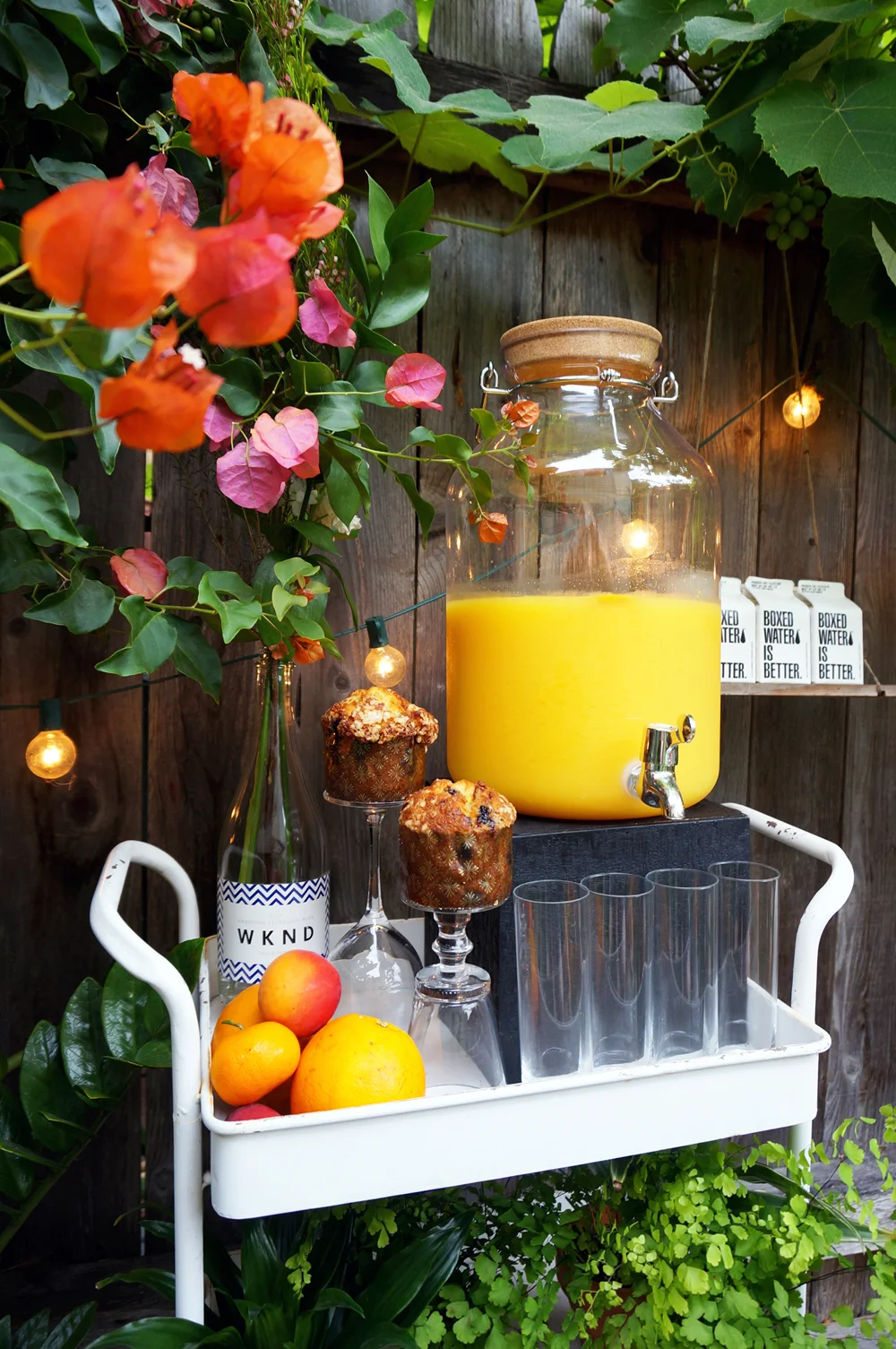 GARDEN BEVERAGE STATION: SPARKLING WINE FOR CLASSIC MIMOSAS BY WINC , H20 BY BOXED WATER .