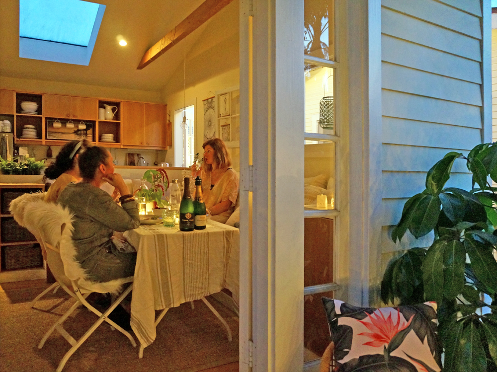 Above: Justina Blakeney of The Jungalow , Erica Reitman , and Jennifer Harrison of Flea Market Fab having dinner at the Cottage.