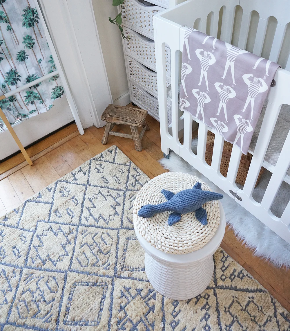 (Also pictured: Handmade Loch Ness monster plush toy by MEVVSAN from etsy // Small wooden stool (vintage) // Daphne white garden stool from home decorators collection // Sailor swaddle by Woolf with me )