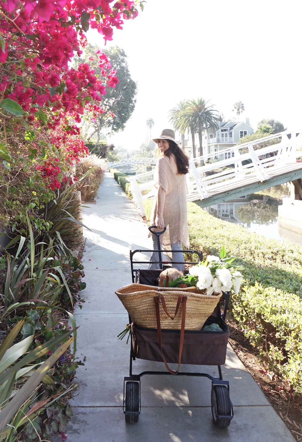 Wearing the SANCHEZ LONG OPEN WEAVE COTTON PONCHO from Monserat De Lucca 