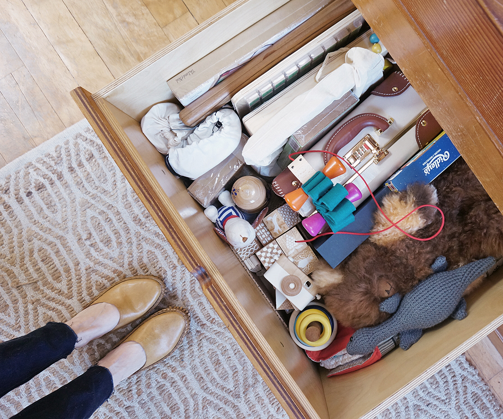 the large Built-in trundle storage bin beneath our bed
