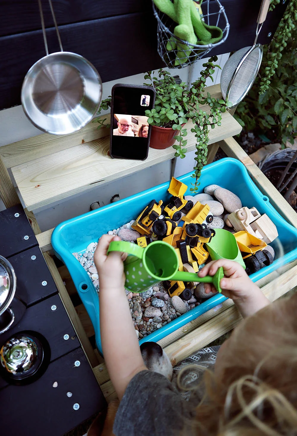 Above: West gives his grandparents (in Florida) a FaceTime tour of his new table.