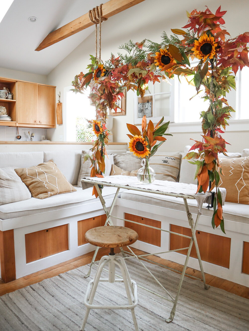 A Living, Over-the-Table Display of Fall Foliage for a Festive Occasion