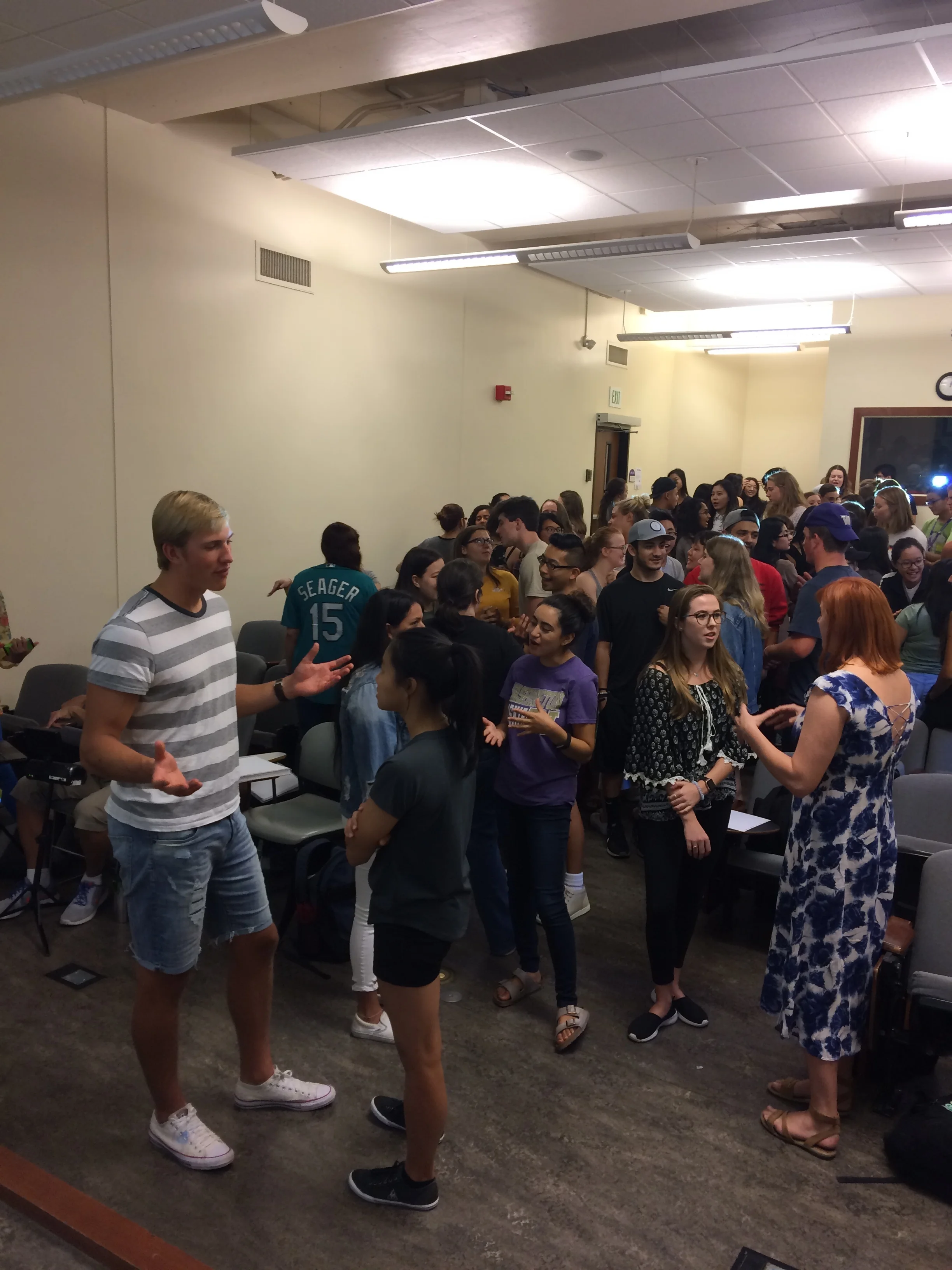 Students get up and find a partner to discuss a reading-related prompt for four minutes (there were 90 undergraduate students in this class and we did five rotations)!