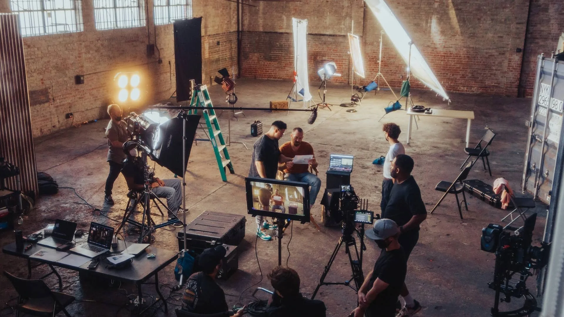 Film-Production-Cast-and-Crew-Movie-Set-with-Actors-and-Director-StudioBinder.jpg