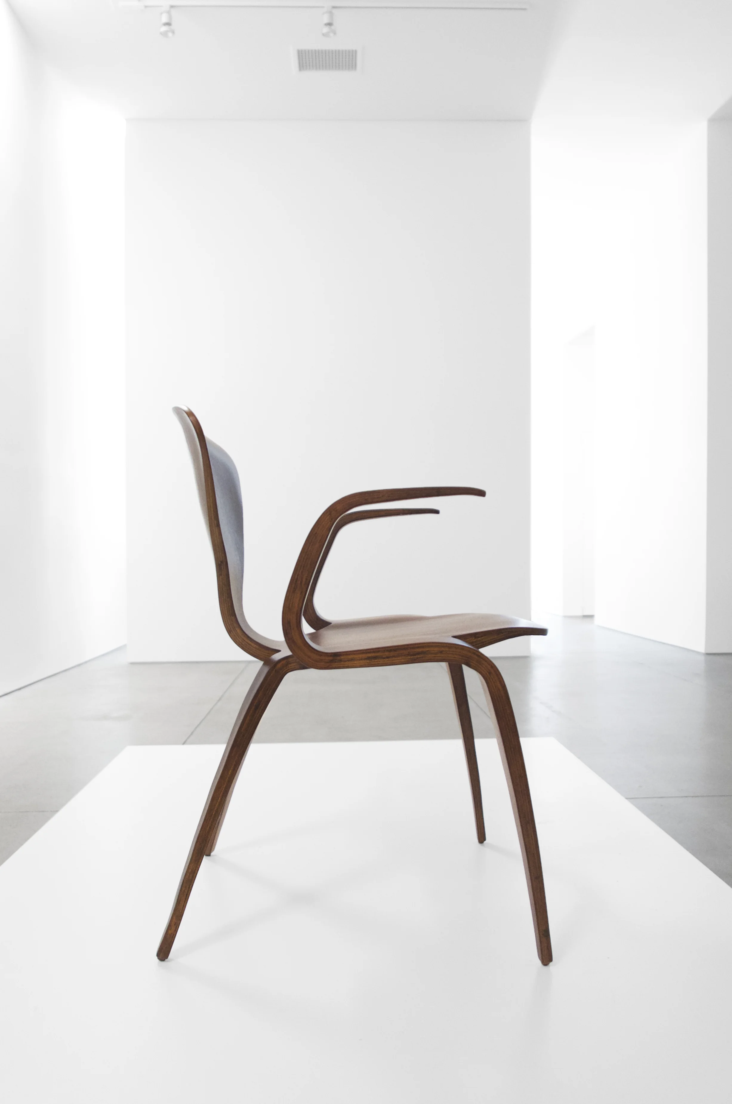 4. Norman Cherner, Rare Prototype Chair, c. 1950, walnut, 30.75H x 23W x 23D inches.jpg