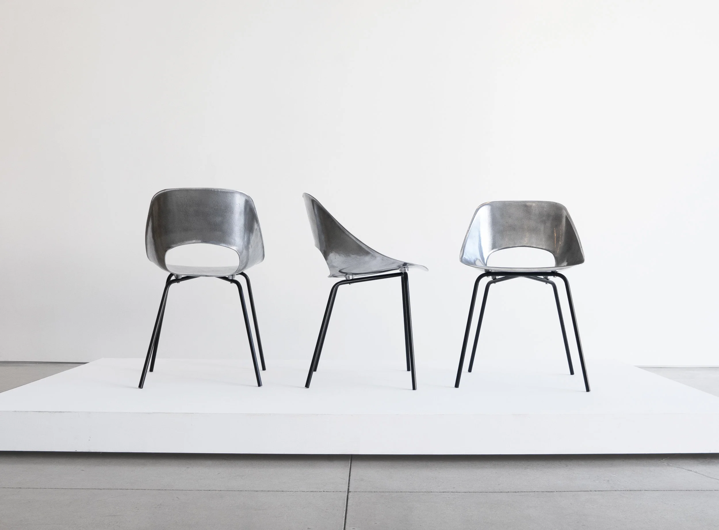 Pierre Guariche, Set of Three “Tonneau” Cast Aluminum Chairs, c. 1950-1959, Aluminum, Iron, 28 H x 18 W x 16 D inches_1.jpg