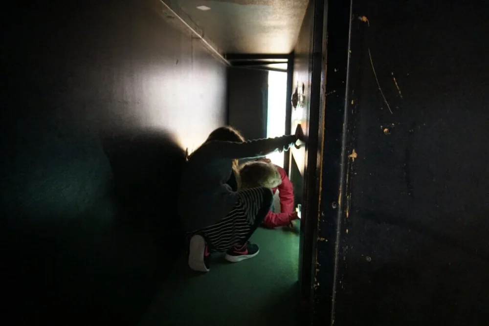 Younger Learners searching nooks and crannies at a local bookstore
