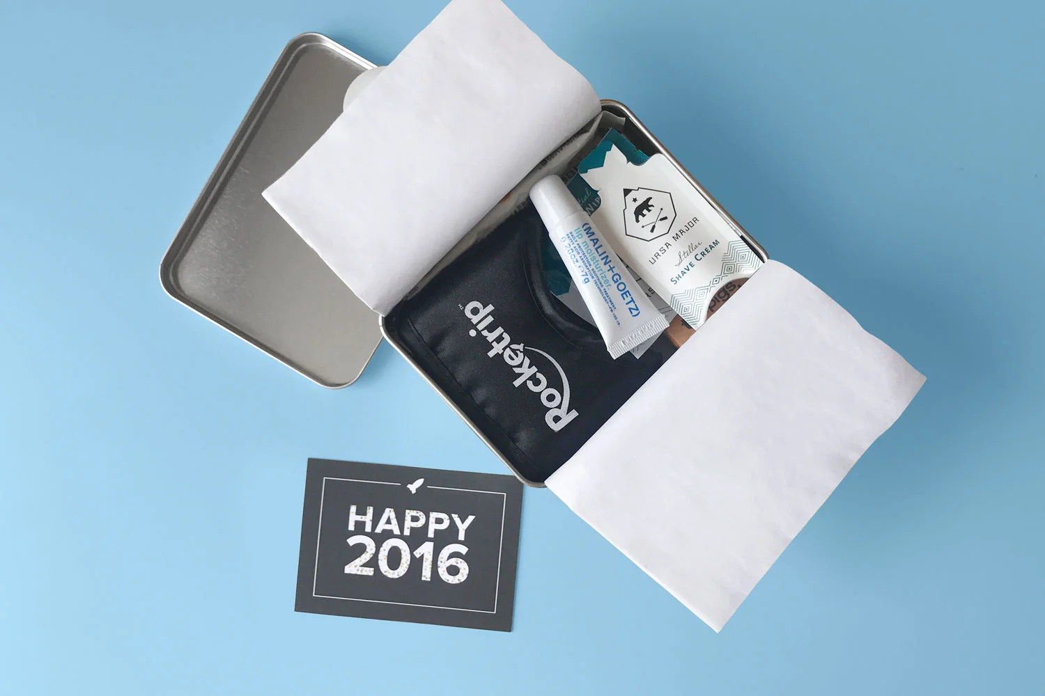  Created holiday gifts inspired by the Carry On Cocktail Kit. Card promoted an offer from LoungeBuddy. 